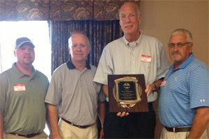 Pictured from left: Jason Witt, Cargill; Marvin Childers, The Poultry Federation; Steve Willardsen, recipient of the 2013 Industry Leader of the Year award; and Tim Kasinger of AgForte, 2013 Turkey Committee chairman.