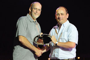 Richard Keeley, right, receiving the award from Jerry Moye, Cobb president.