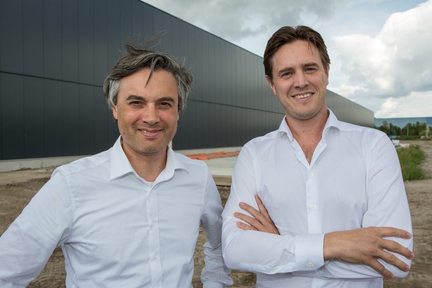 Tarique Arsiwalla (left) and Kees Aarts stand in front of their new ¬ 35 million production facility. Photo: Peter Roek