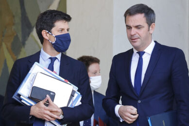French agriculture minister, Julien Denormandie (L), and French health minister, Olivier Veran (R), speak together as they leave the Elysee Presidential Palace after a weekly cabinet meeting in Paris. Photo: ANP